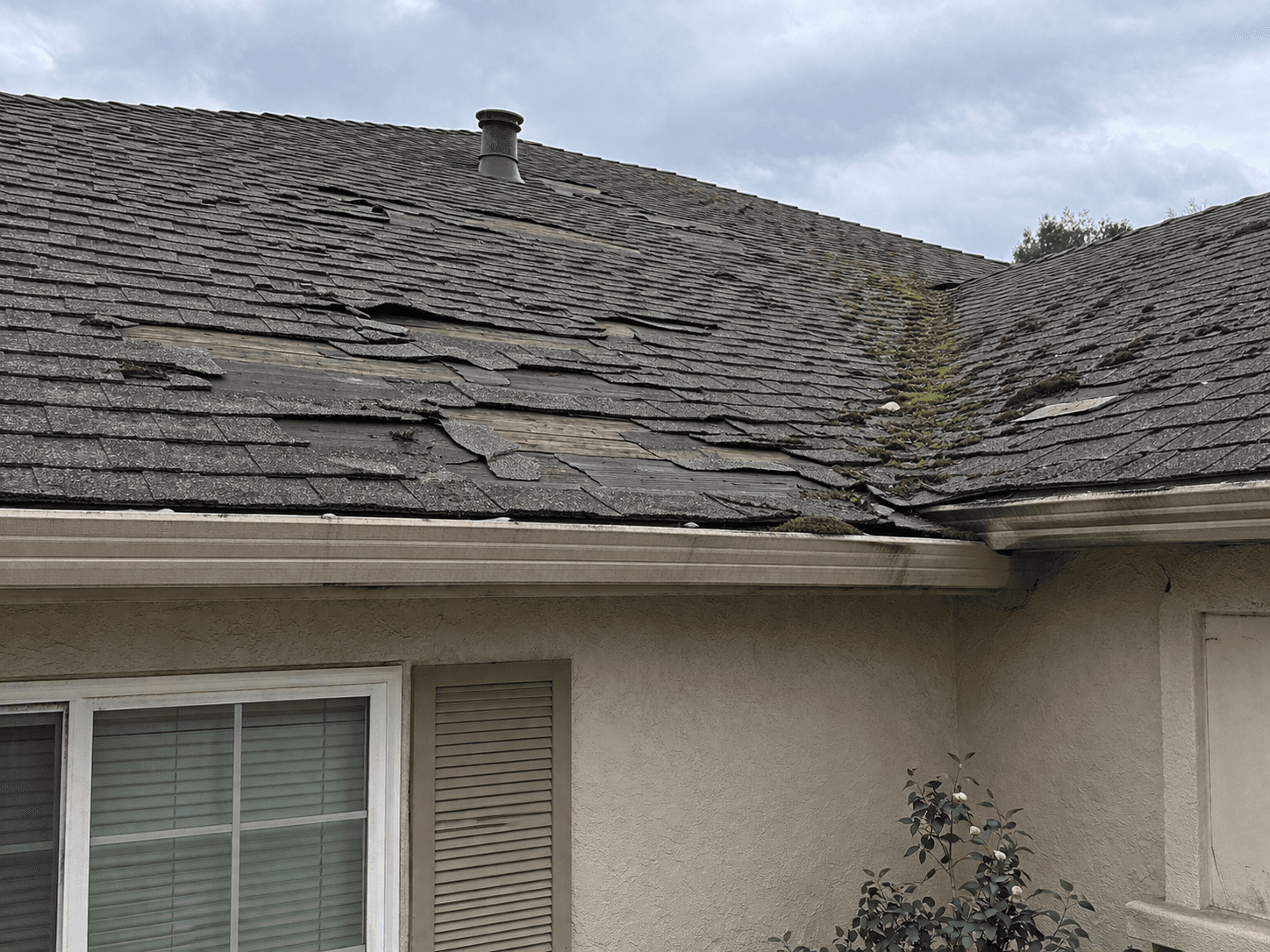 Damaged roof showing signs of wear in Fresno